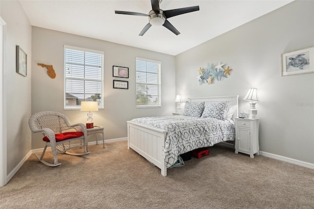 bedroom with ceiling fan and light colored carpet