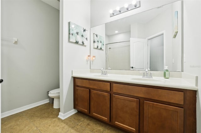 bathroom featuring tile patterned floors, a shower, vanity, and toilet