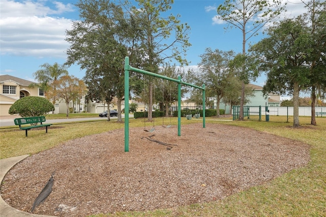 surrounding community featuring a yard and a playground