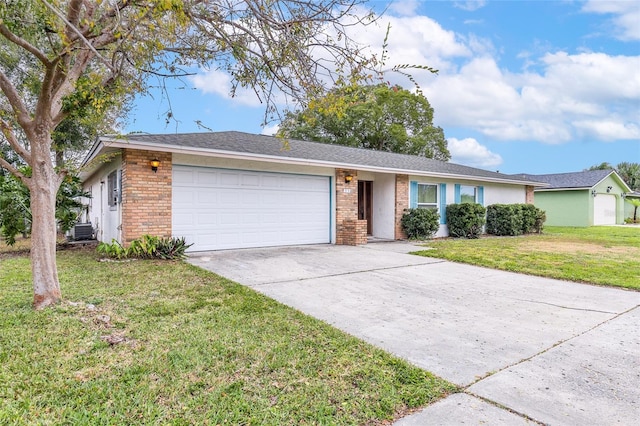 ranch-style house with driveway, brick siding, an attached garage, central AC, and a front yard