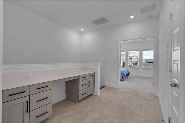 unfurnished office with light colored carpet