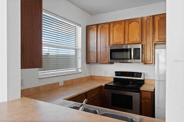 kitchen with stainless steel appliances and sink