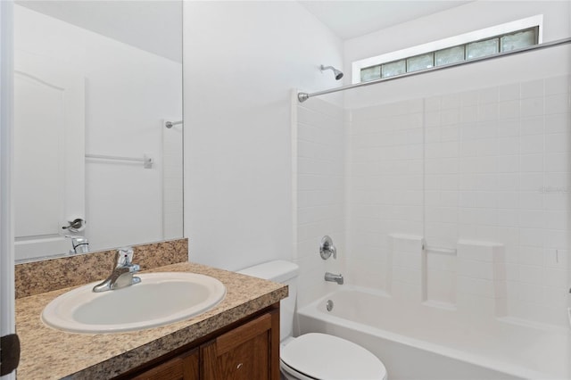 full bathroom featuring vanity, tub / shower combination, and toilet