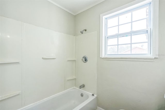 bathroom featuring shower / bath combination and crown molding