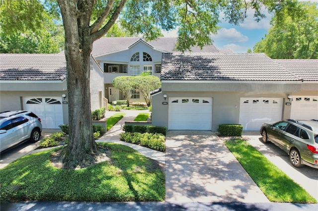 view of front of home with a garage