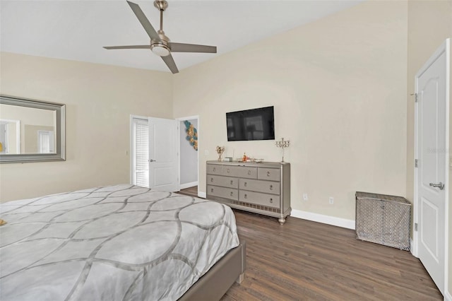 bedroom featuring dark wood-type flooring, ceiling fan, and lofted ceiling