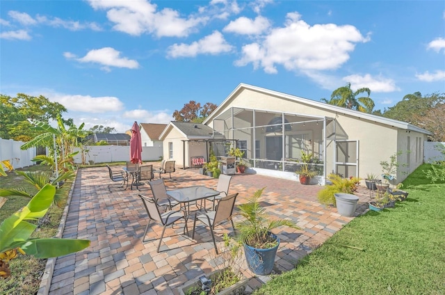 view of patio / terrace with a lanai