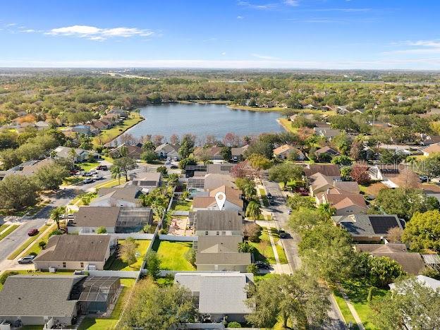 birds eye view of property featuring a water view