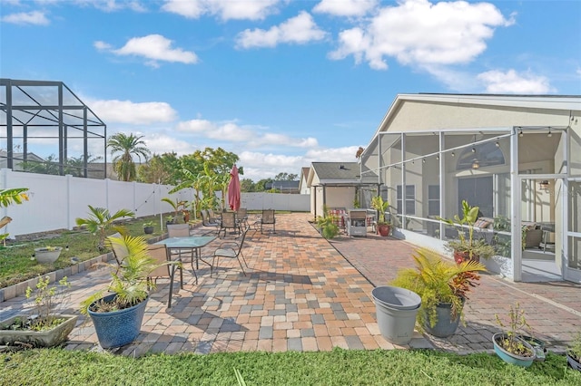 view of patio / terrace with glass enclosure