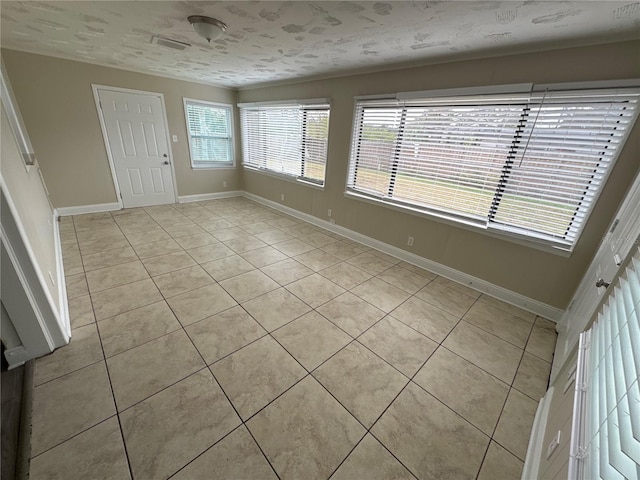 interior space with light tile patterned flooring