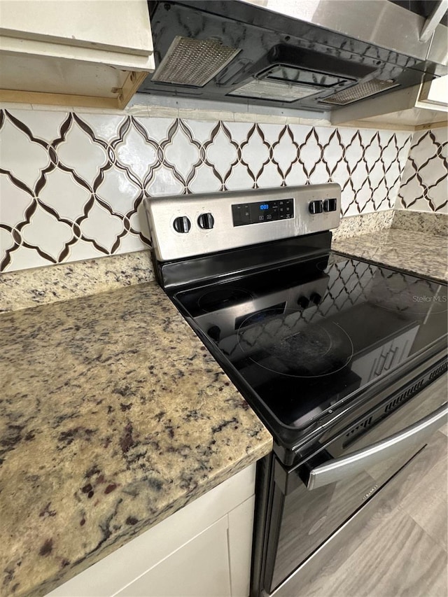 kitchen featuring stainless steel electric stove