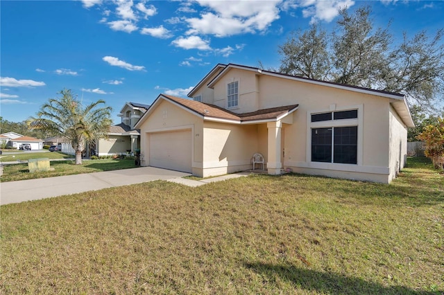 view of front facade featuring a garage and a front yard