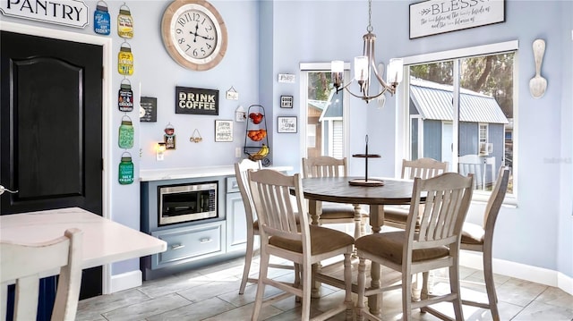 dining room featuring an inviting chandelier