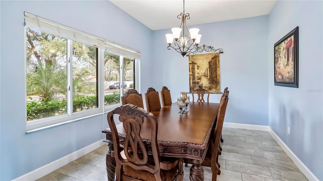 dining room with a chandelier