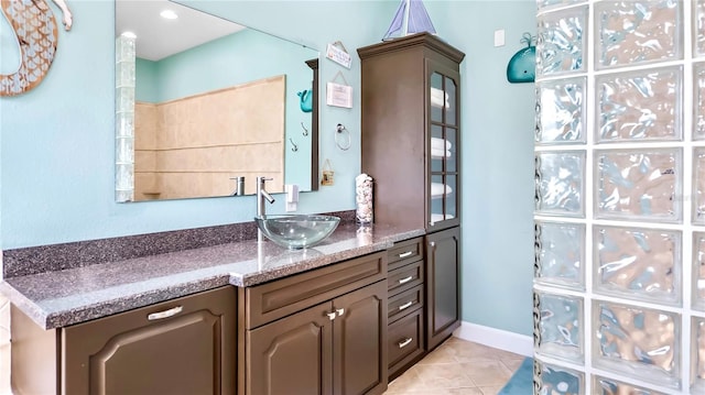 bathroom featuring vanity and tile patterned floors