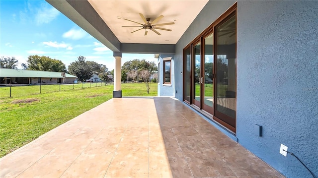 view of patio / terrace featuring ceiling fan