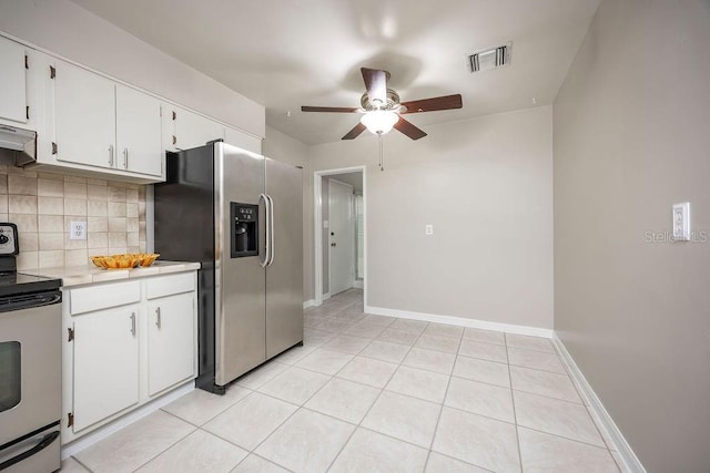 kitchen with white cabinets, electric stove, light tile patterned floors, tasteful backsplash, and stainless steel fridge with ice dispenser