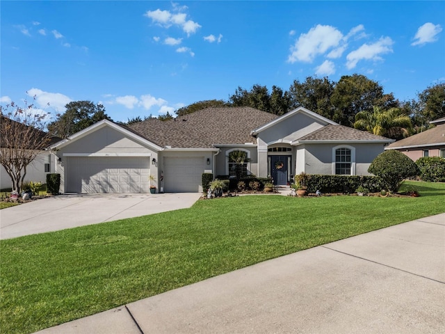 ranch-style home featuring a garage and a front lawn