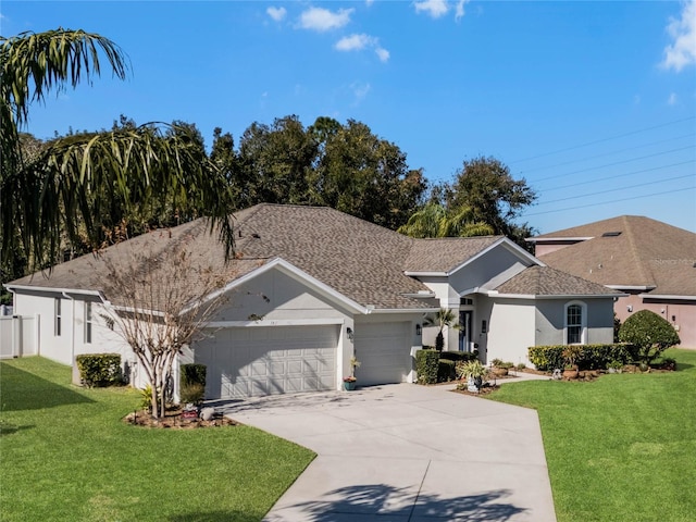 ranch-style house with a garage and a front lawn