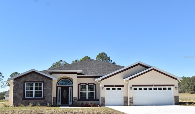 view of front of house with a garage