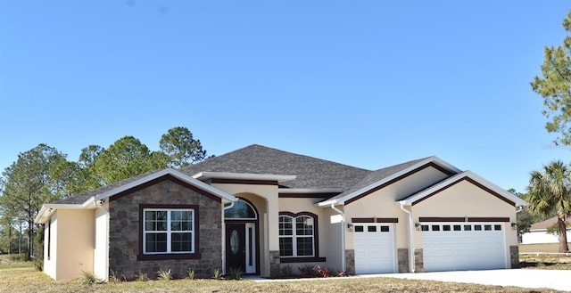 view of front of home with a garage