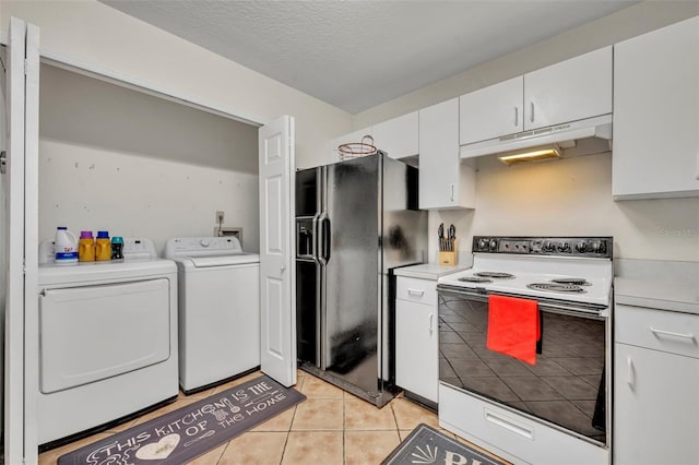 kitchen featuring light tile patterned floors, independent washer and dryer, white electric stove, black fridge with ice dispenser, and white cabinets