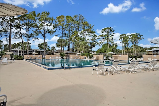 view of swimming pool featuring a patio