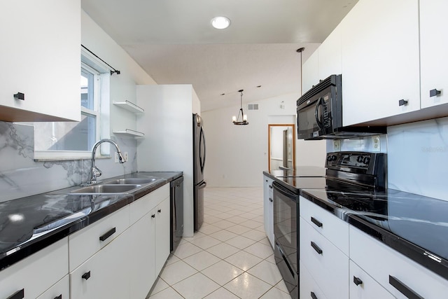 kitchen with hanging light fixtures, sink, white cabinets, and black appliances