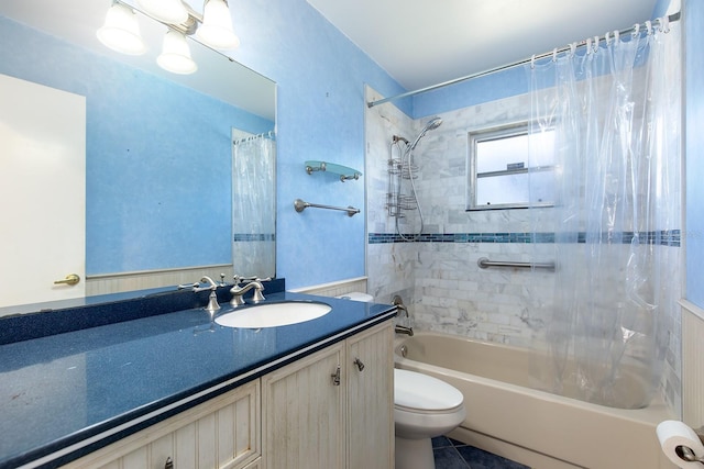 full bathroom with tile patterned flooring, shower / bath combination with curtain, vanity, and toilet