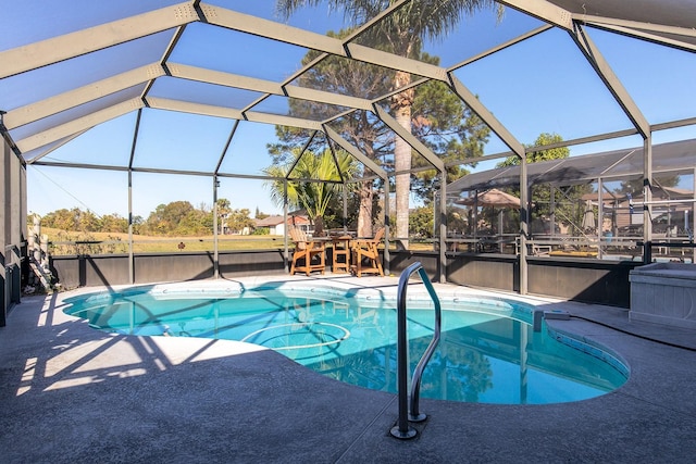 view of pool featuring a lanai