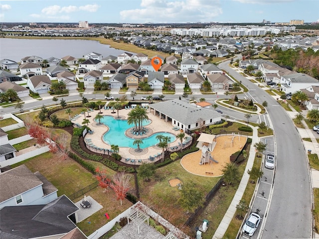 birds eye view of property featuring a water view