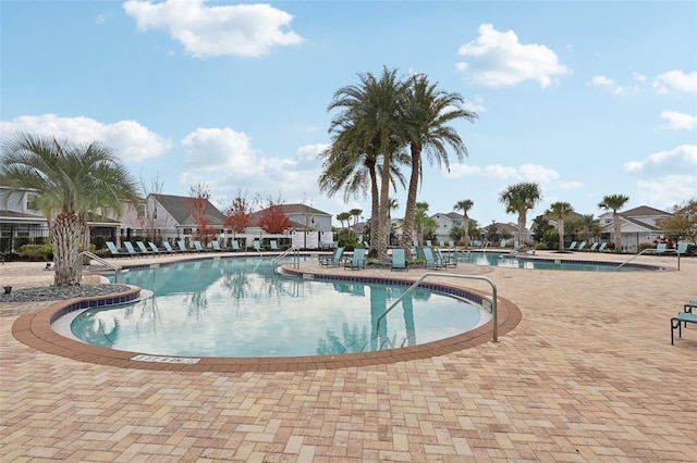 view of swimming pool featuring a patio