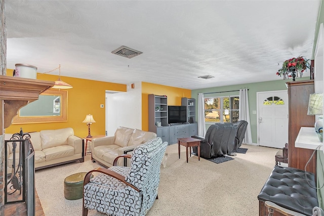 living room featuring a textured ceiling