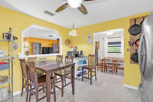 dining room featuring ceiling fan