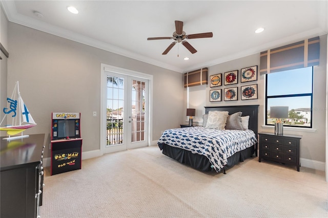 carpeted bedroom featuring access to outside, ceiling fan, french doors, and crown molding