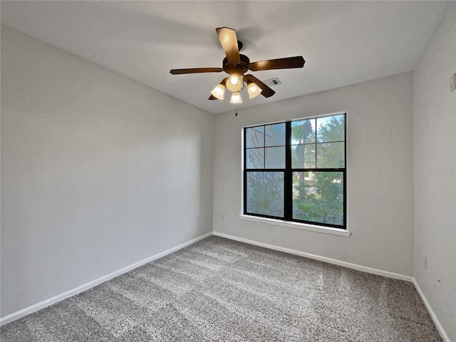 unfurnished room featuring carpet flooring and ceiling fan