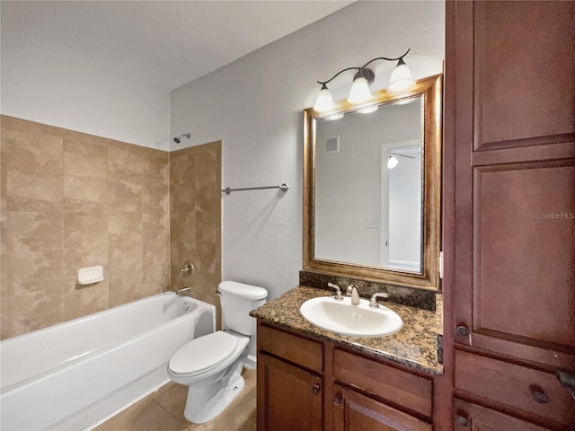 full bathroom featuring tile patterned flooring, vanity, toilet, and bathing tub / shower combination