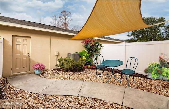 view of patio / terrace featuring central air condition unit