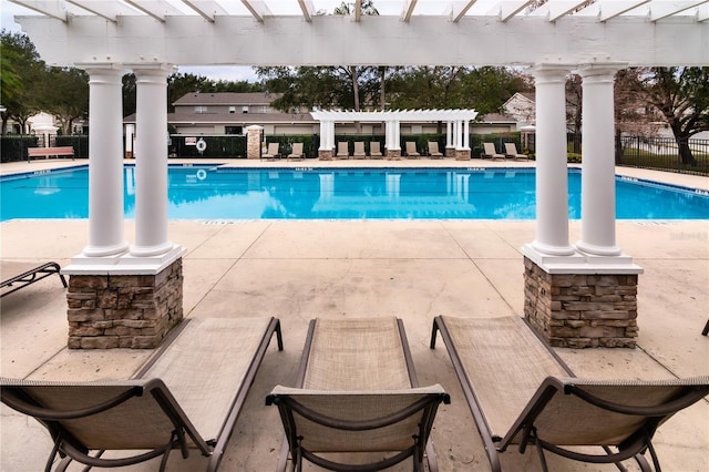 view of pool featuring a pergola and a patio area