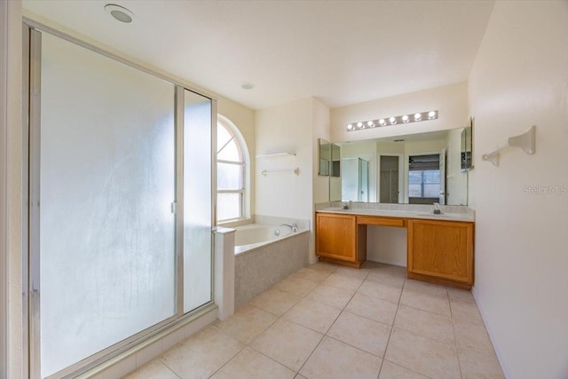 bathroom featuring separate shower and tub, tile patterned flooring, and vanity