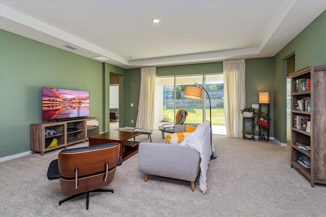 living area featuring light colored carpet