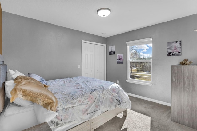 carpeted bedroom featuring a closet