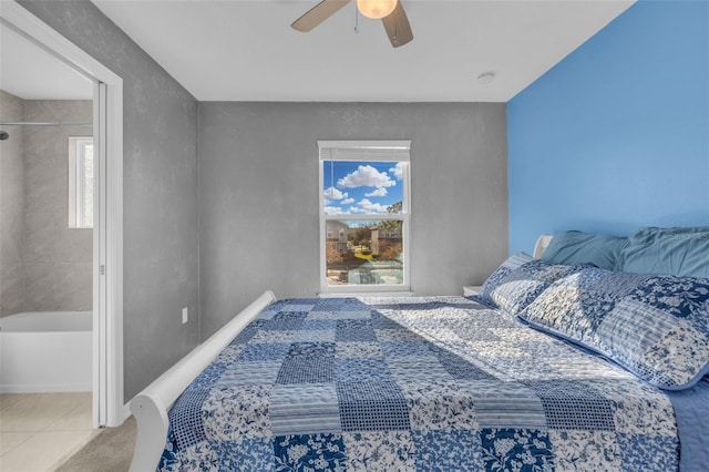 bedroom with ceiling fan and light tile patterned flooring