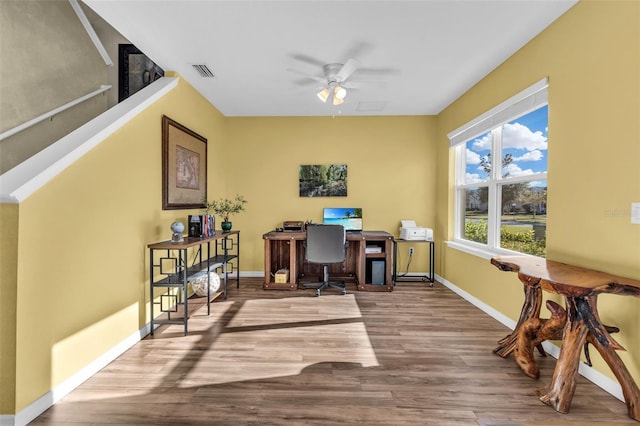 home office featuring ceiling fan and wood-type flooring