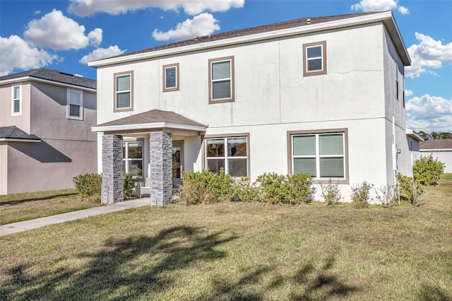 view of front of house featuring a front lawn