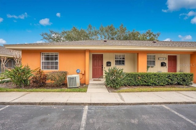 view of front of home with cooling unit