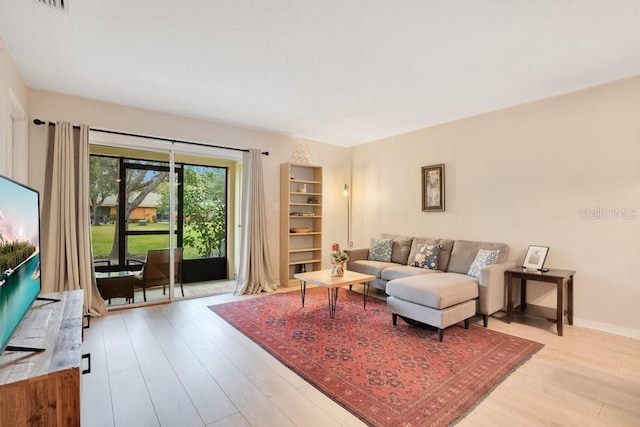 living room featuring light wood-type flooring