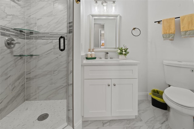 bathroom featuring toilet, a shower with shower door, and vanity