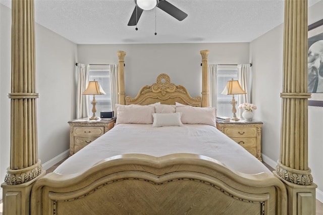 bedroom featuring a textured ceiling and ceiling fan