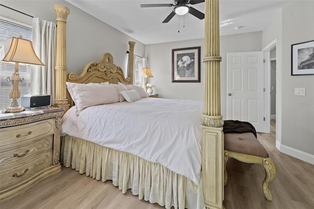 bedroom with light wood-type flooring and ceiling fan